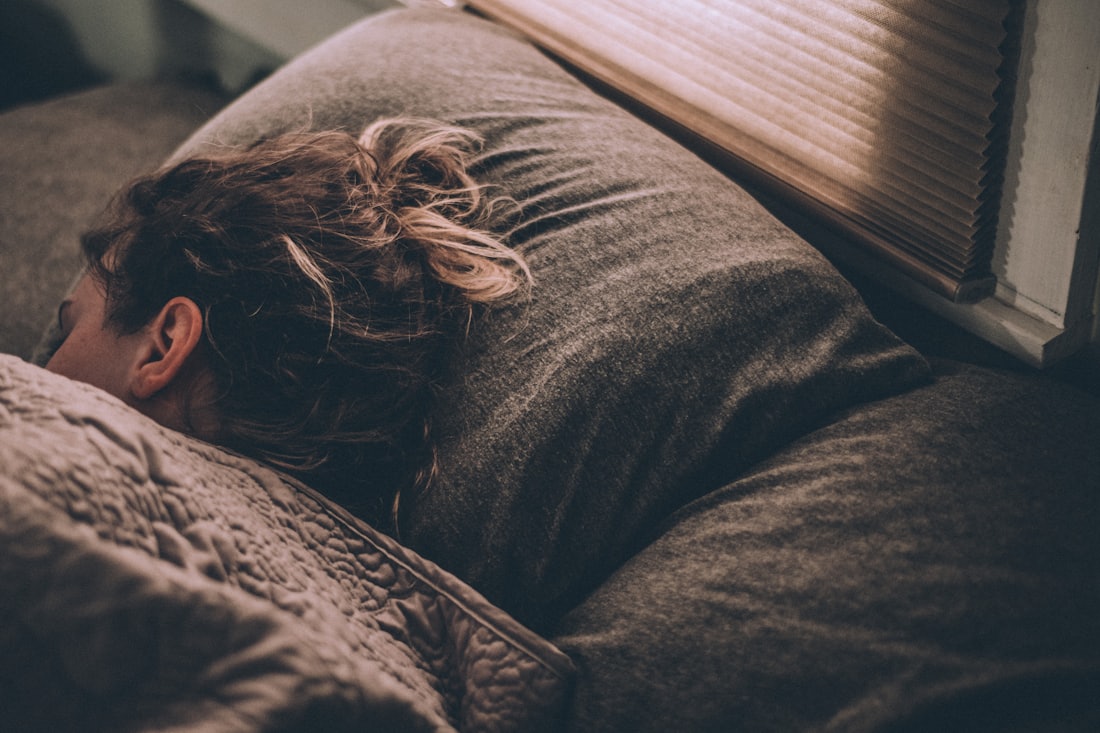Man asleep in bed